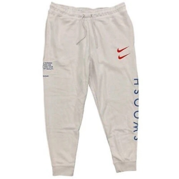 Nike Kids Cream Joggers with Red Swoosh and Blue Lettering - Picture 3 of 3